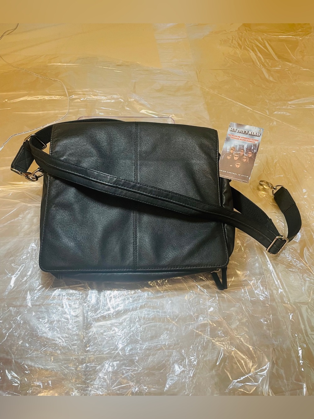 Gun Tote'n Mamas GTM-26/BK is unisex, full-flap concealed carry Messenger Bag